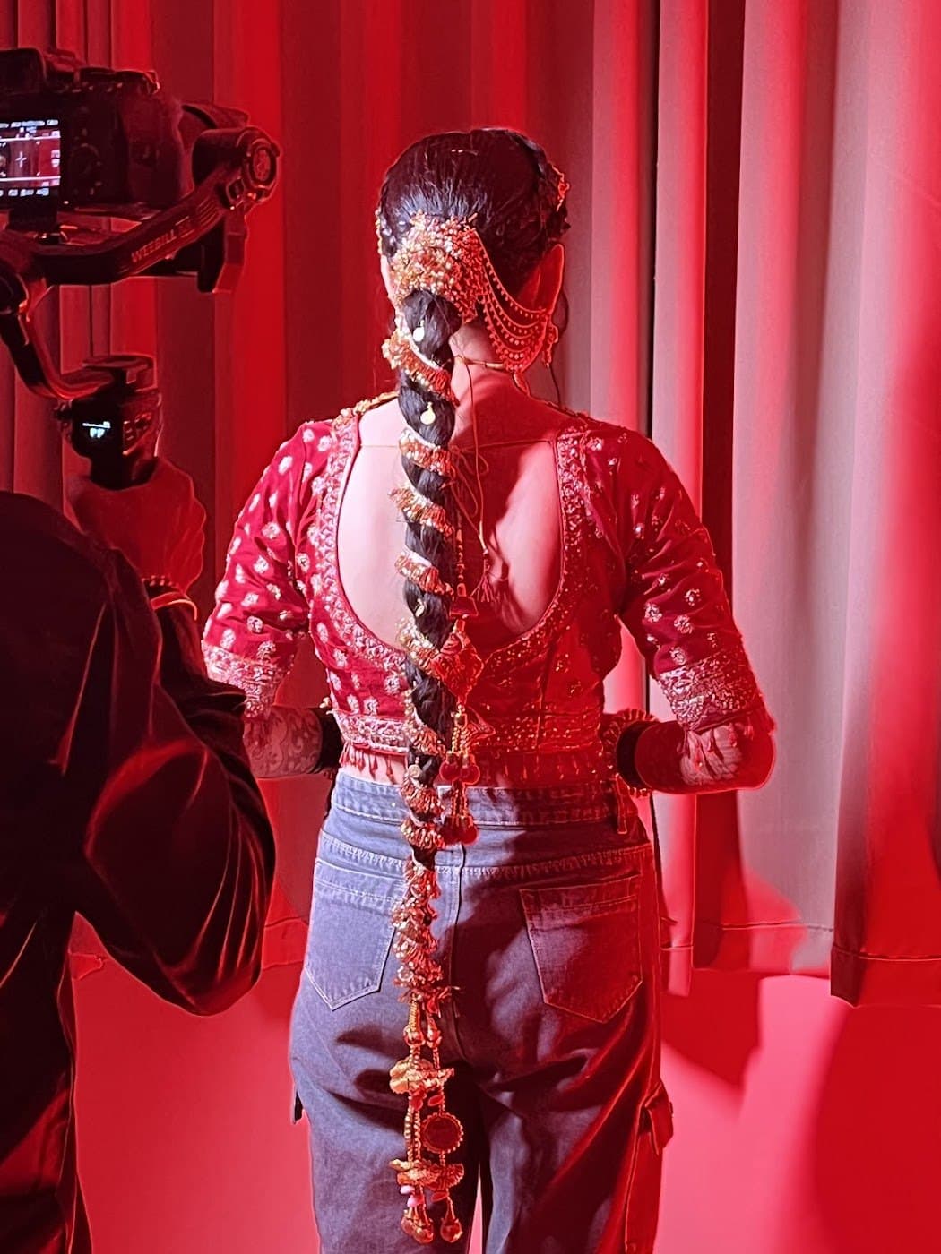 Long jewelled braid hairstyle during a model photoshoot