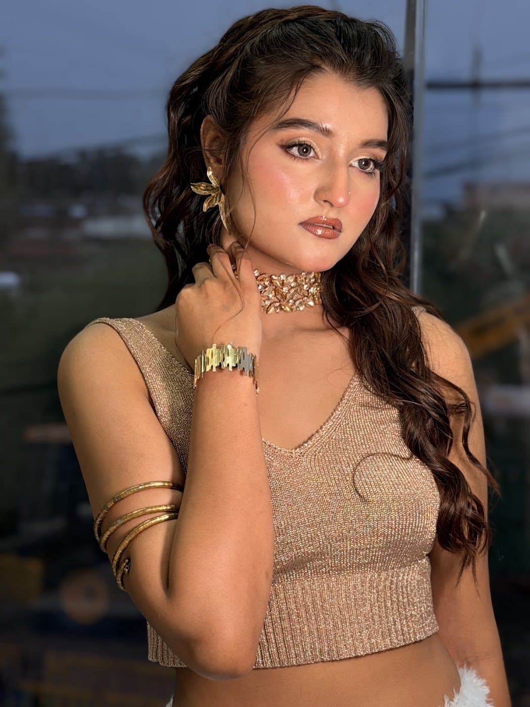 Model shoot makeup with glowing skin and bronze eyes